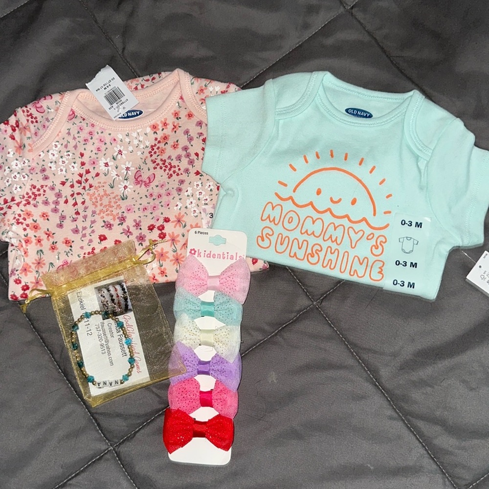 A bundle of new infant wear.